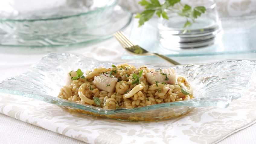 Foto de Arroz meloso de calamar y rape
