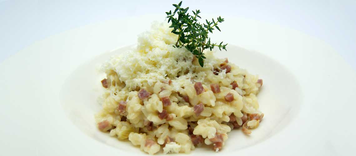 Foto de Arroz cremoso con jamón y queso ahumado
