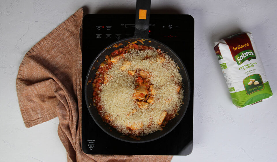 Incorporar arroz a arroz con pollo