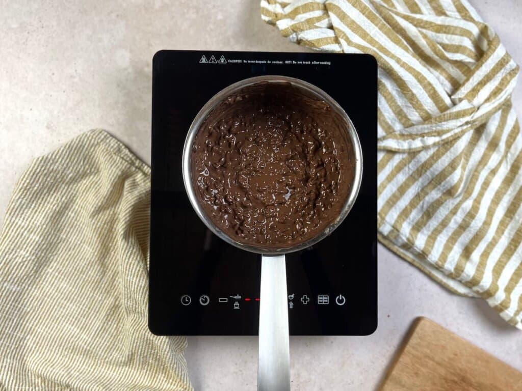 Receta arroz con leche de la abuela paso 3 agrega el azúcar moreno y deja cocer 5 minutos más