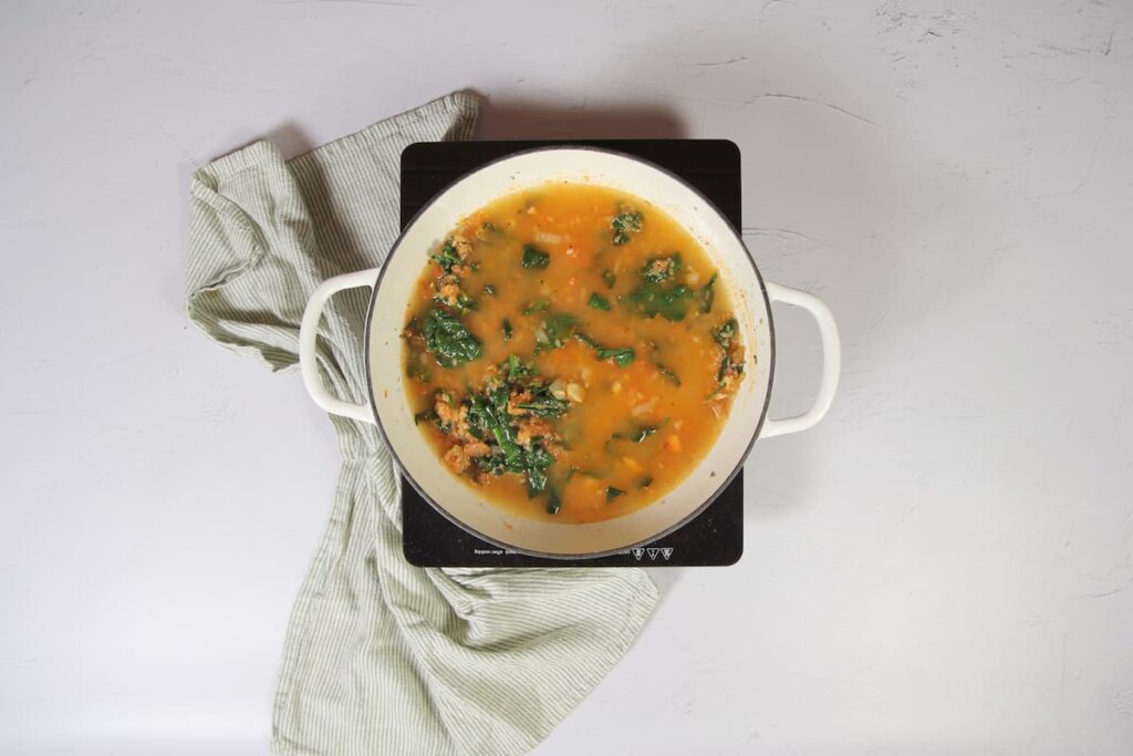 Añadir el arroz y el caldo