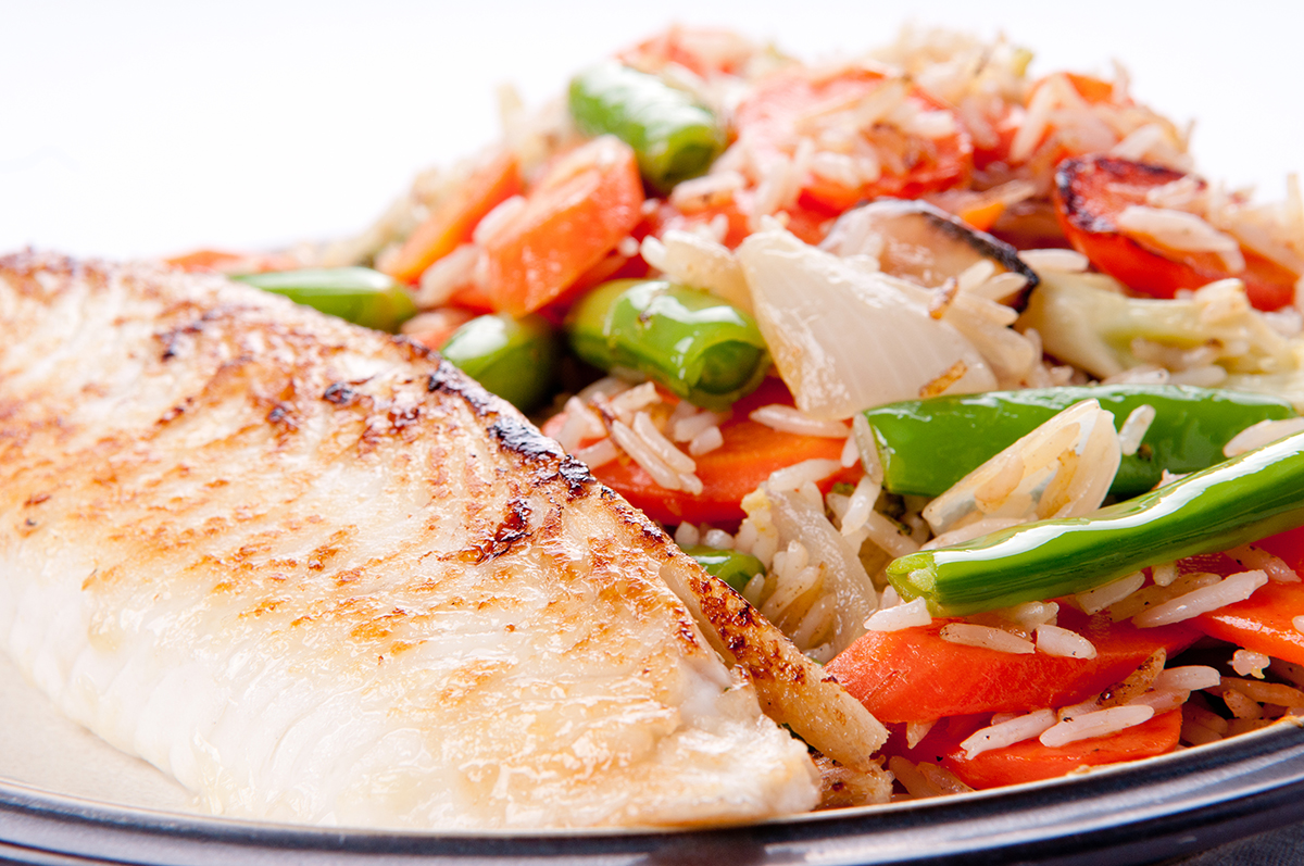 seared tilapia fish filet with rice stir fry 2023 02 28 05 57 37 utc copia