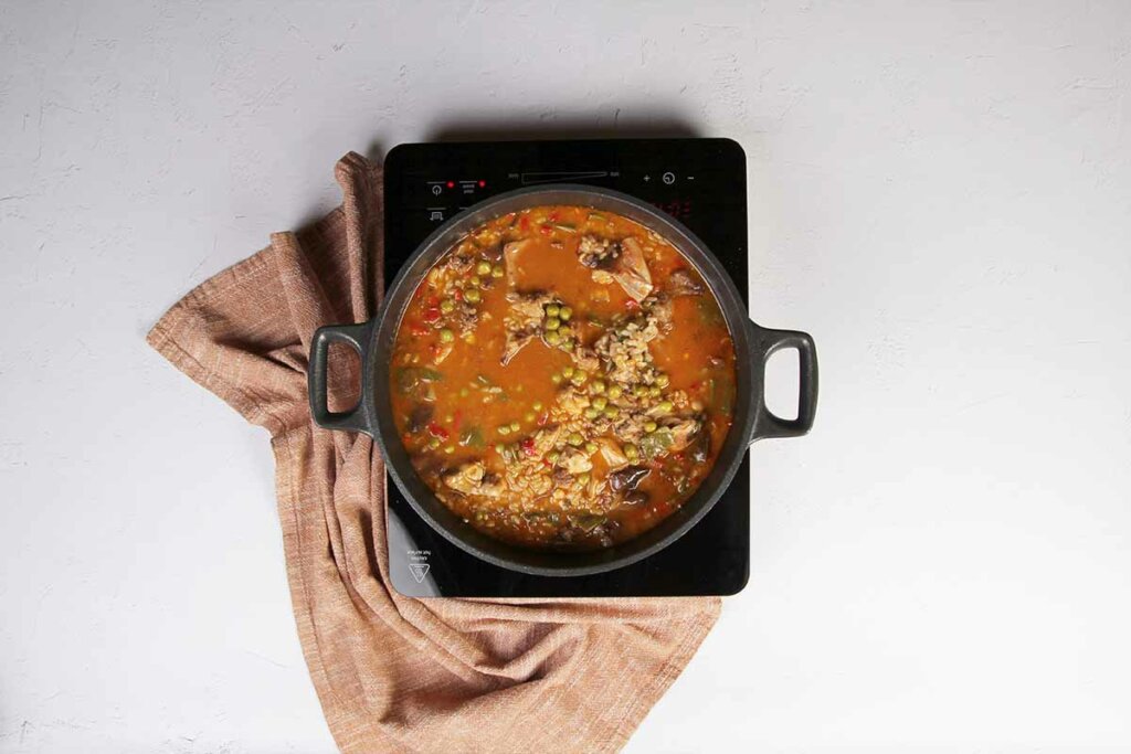 paso a paso arroz con costillas y conejo guisantes