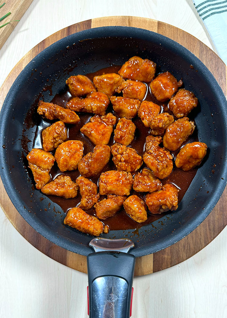 Elaborar salsa e integrar pollo en Pollo frito con arroz
