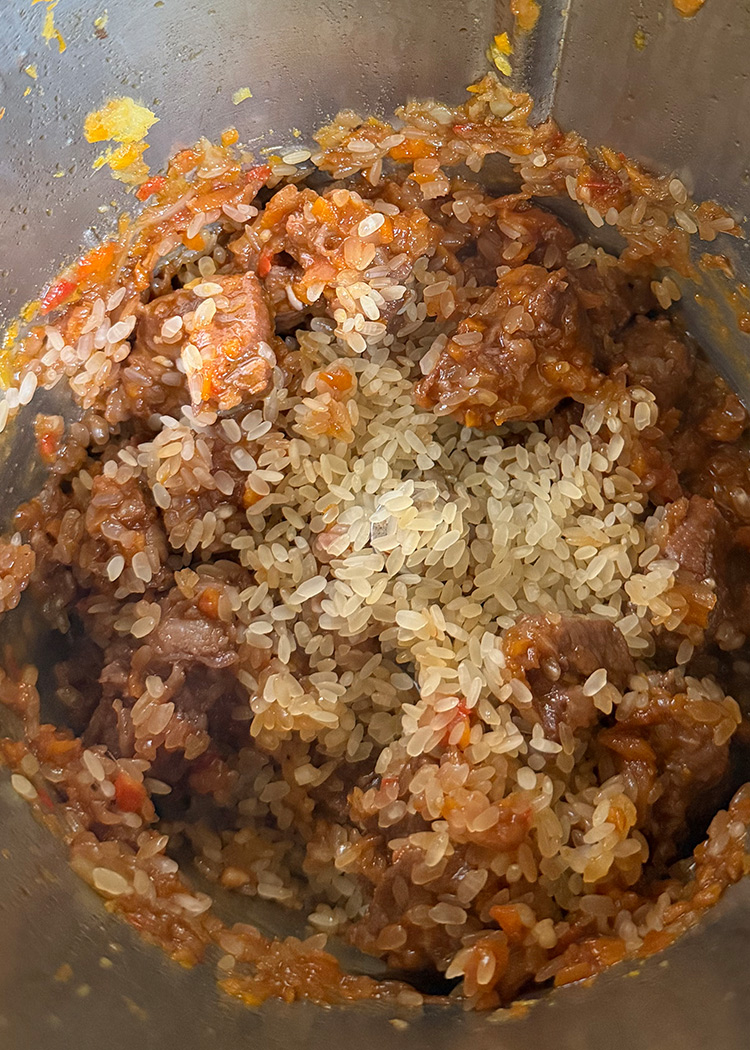 añadir arroz para arroz con carrilleras en thermomix