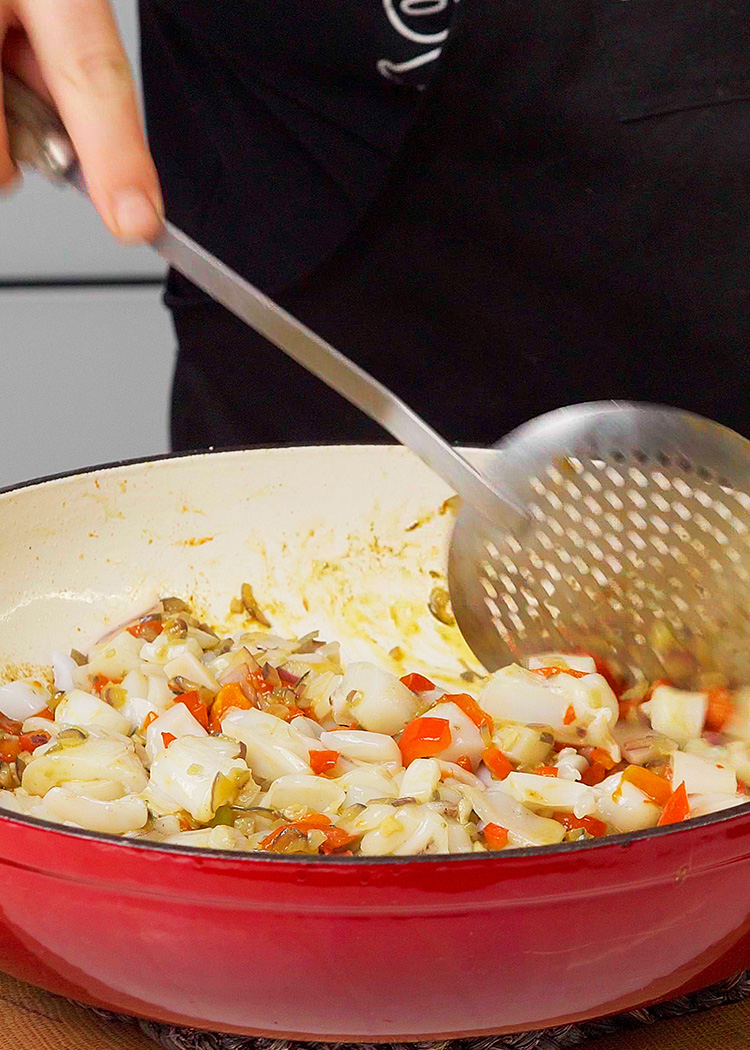 incorporar marisco para arroz con marisco